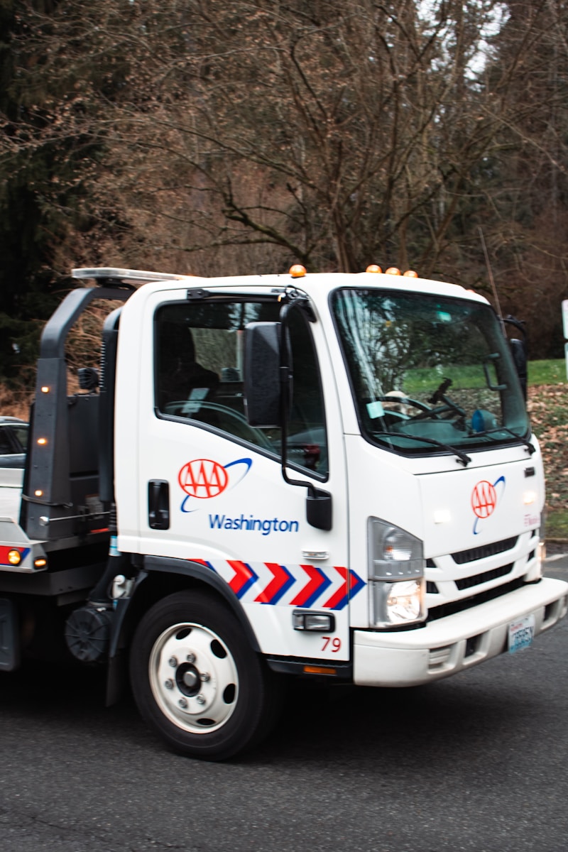 A white aaa washington tow truck.